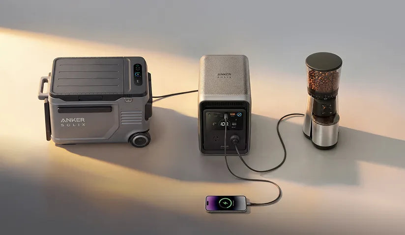 Anker SOLIX S2000 charging a car fridge, coffee grinder and smartphone at the same time